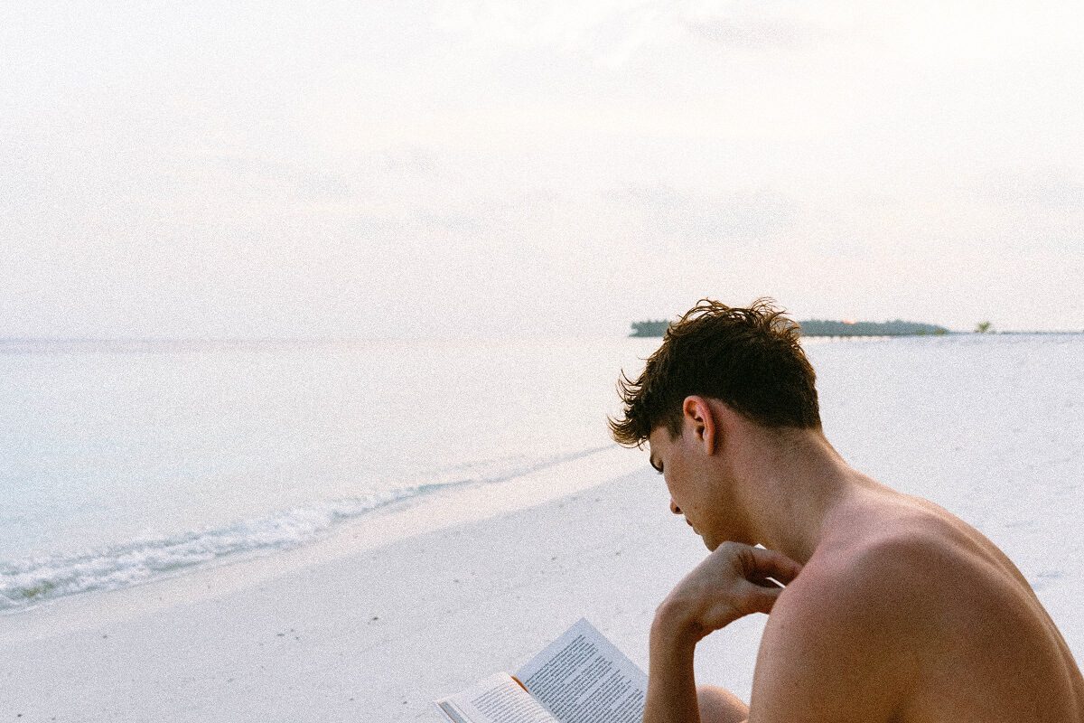 reading book on the beach